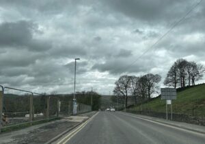 Woman halts lorries with hatchback, briefly interrupts region’s ongoing tribute to dirt