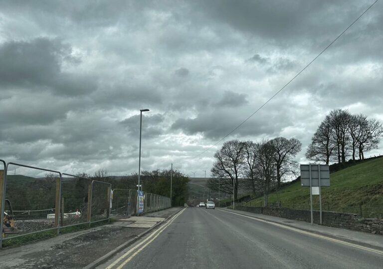 Woman halts lorries with hatchback, briefly interrupts region’s ongoing tribute to dirt